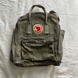 Army green Fjallraven Kanken backpack